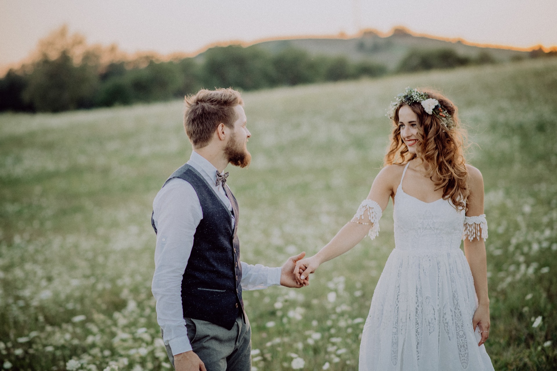 beautiful-bride-and-groom-at-sunset-in-green-natur-PZ6Q2F6.jpg