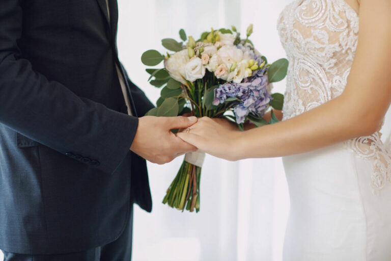 optimize-young-beautiful-bride-is-standing-with-her-husband.jpg